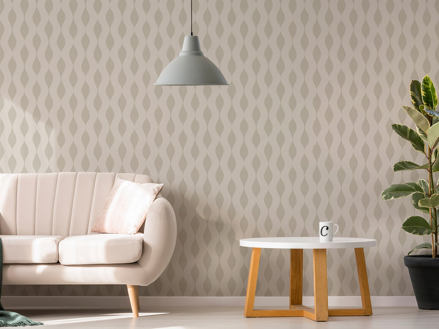 Keziah – beige soffa med vitt soffbord och stor grön växt